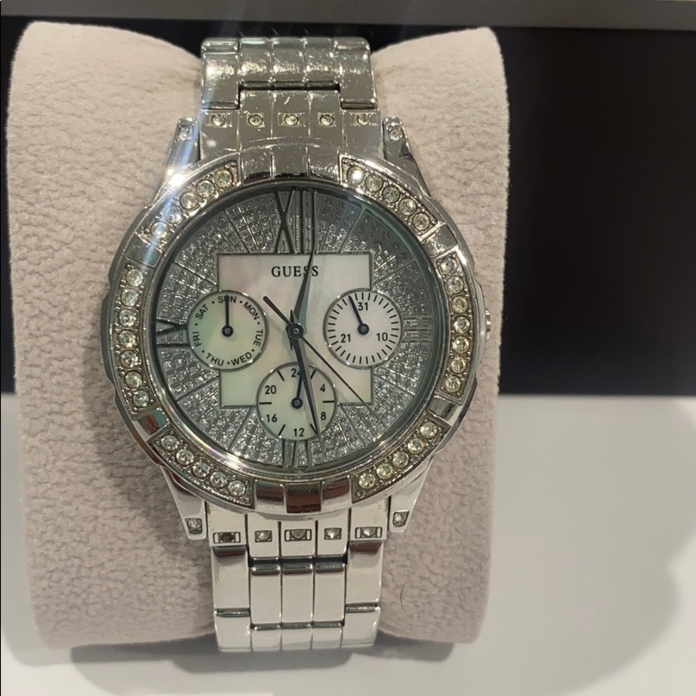 Guess women’s silver watch